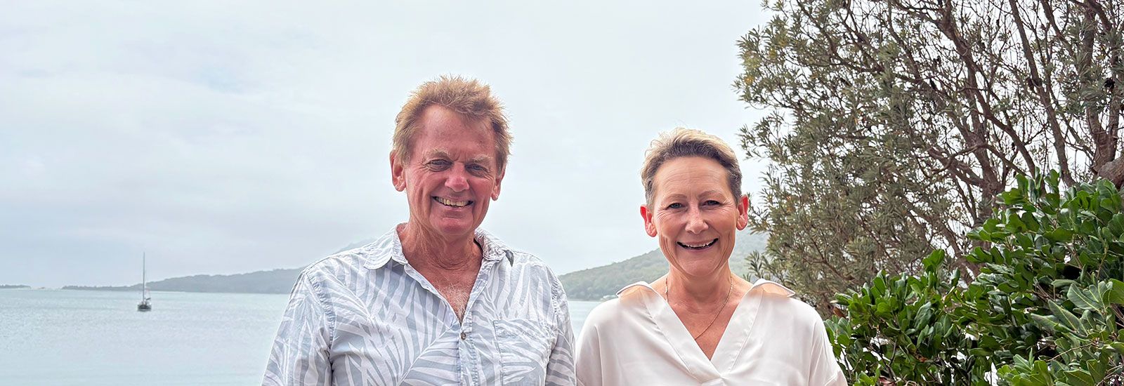 Mayor Leah Anderson with Mike Shaw from the Shoal Bay West Landcare Group at Shoal Bay foreshore. banner image