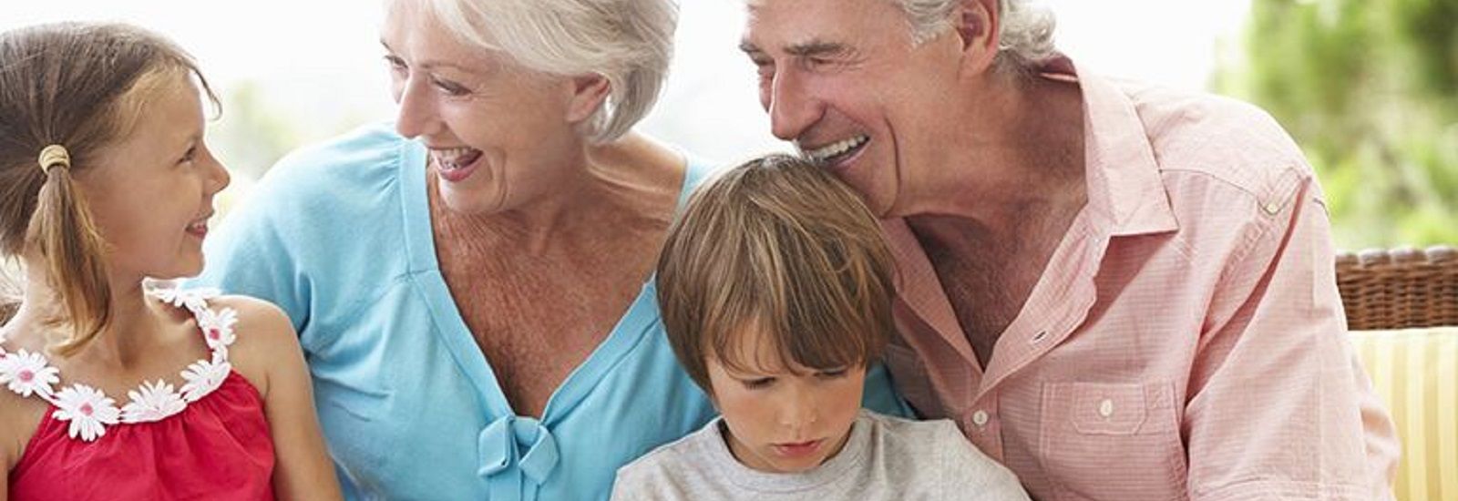 grandparents sitting with children banner image